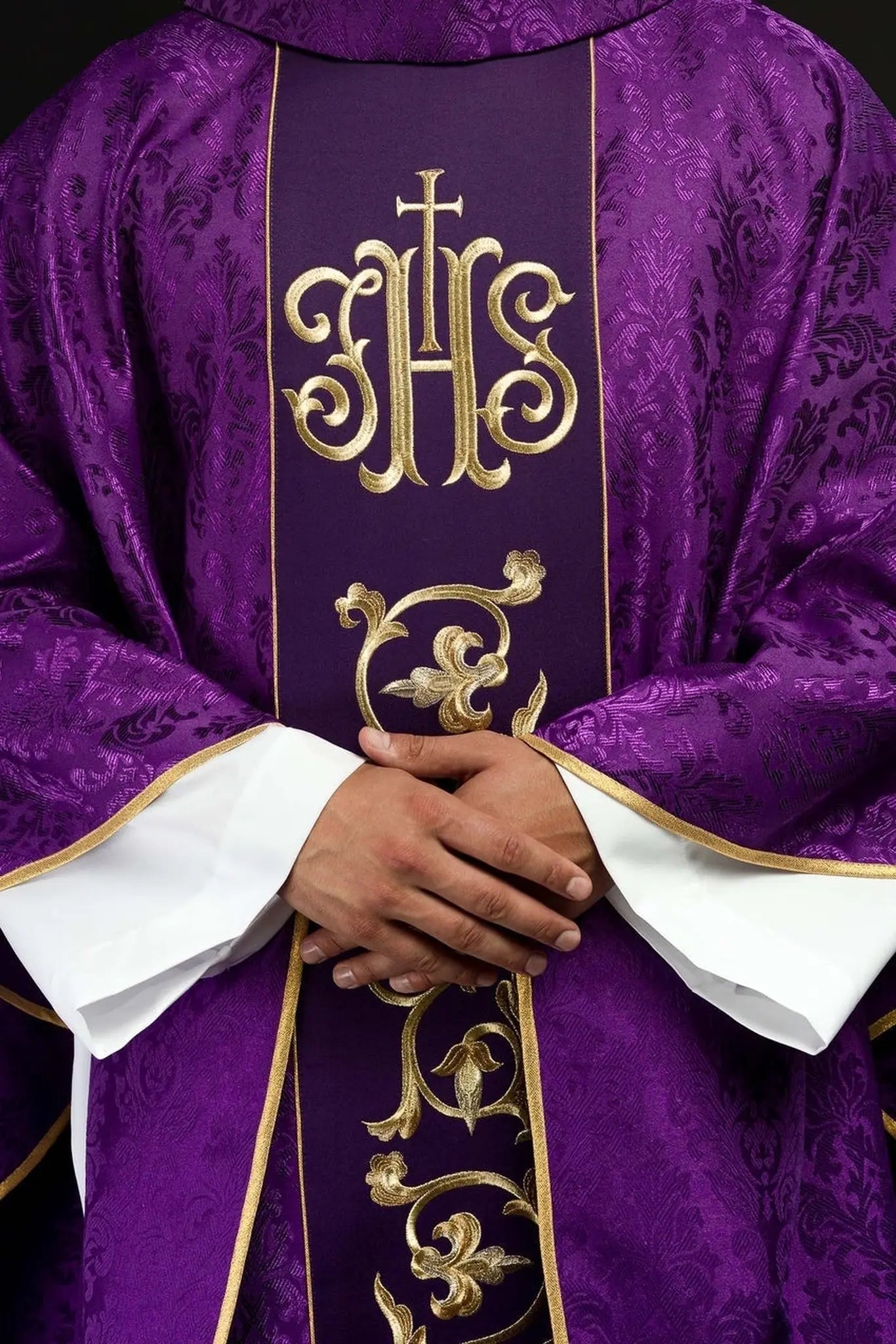 Purple liturgical chasuble with richly decorated IHS belt