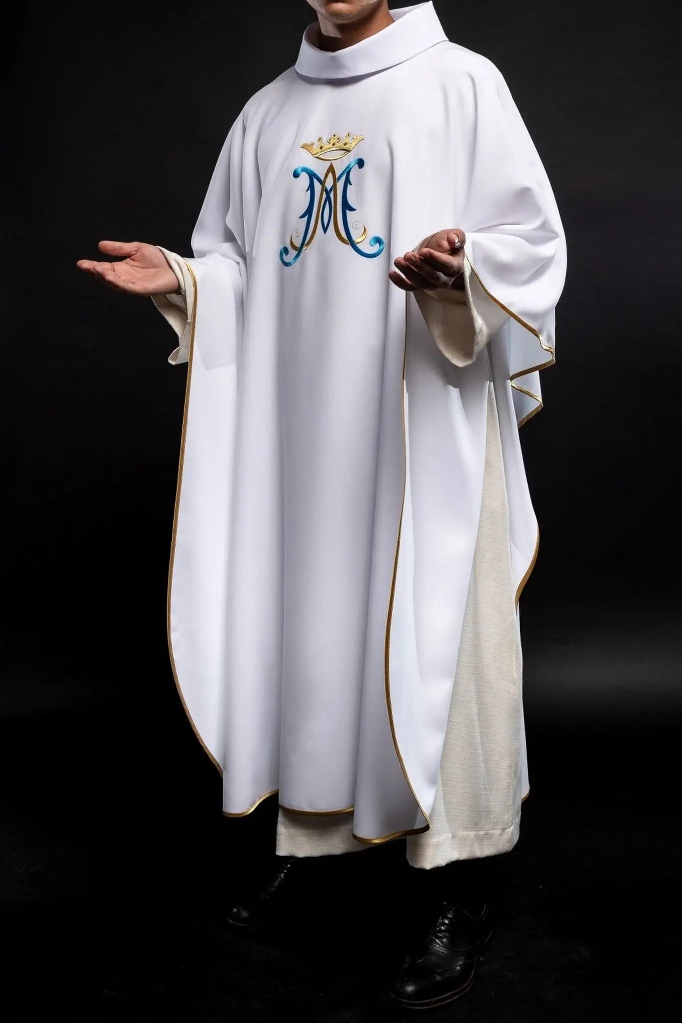 White chasuble embroidered with Marian motif