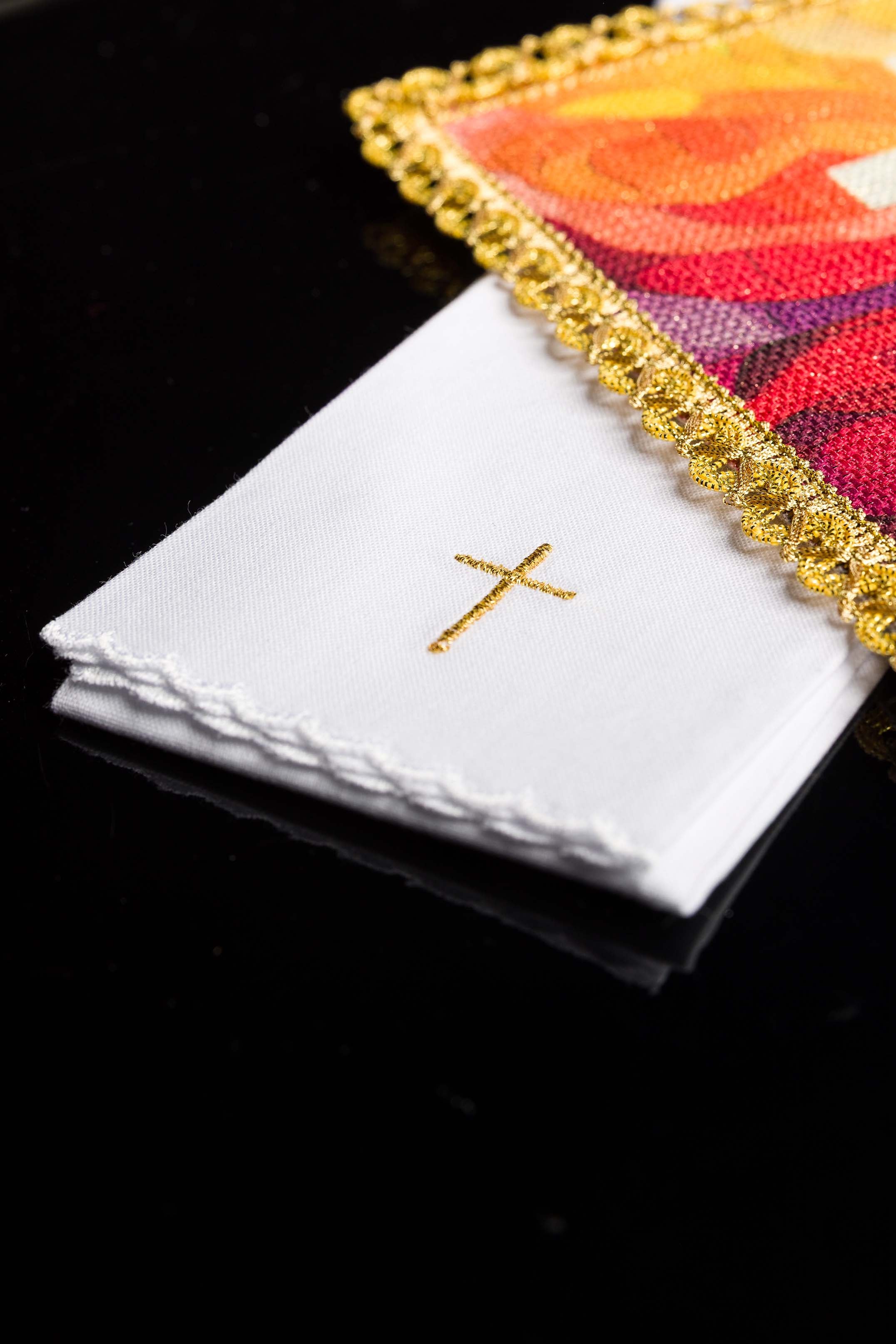 Complete chalice linen set with multicolour cross pall, corporal, purificator and lavabo towel arranged together