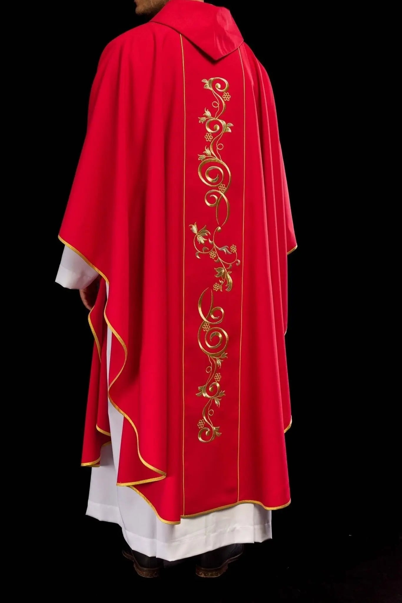 Red chasuble embroidered with IHS