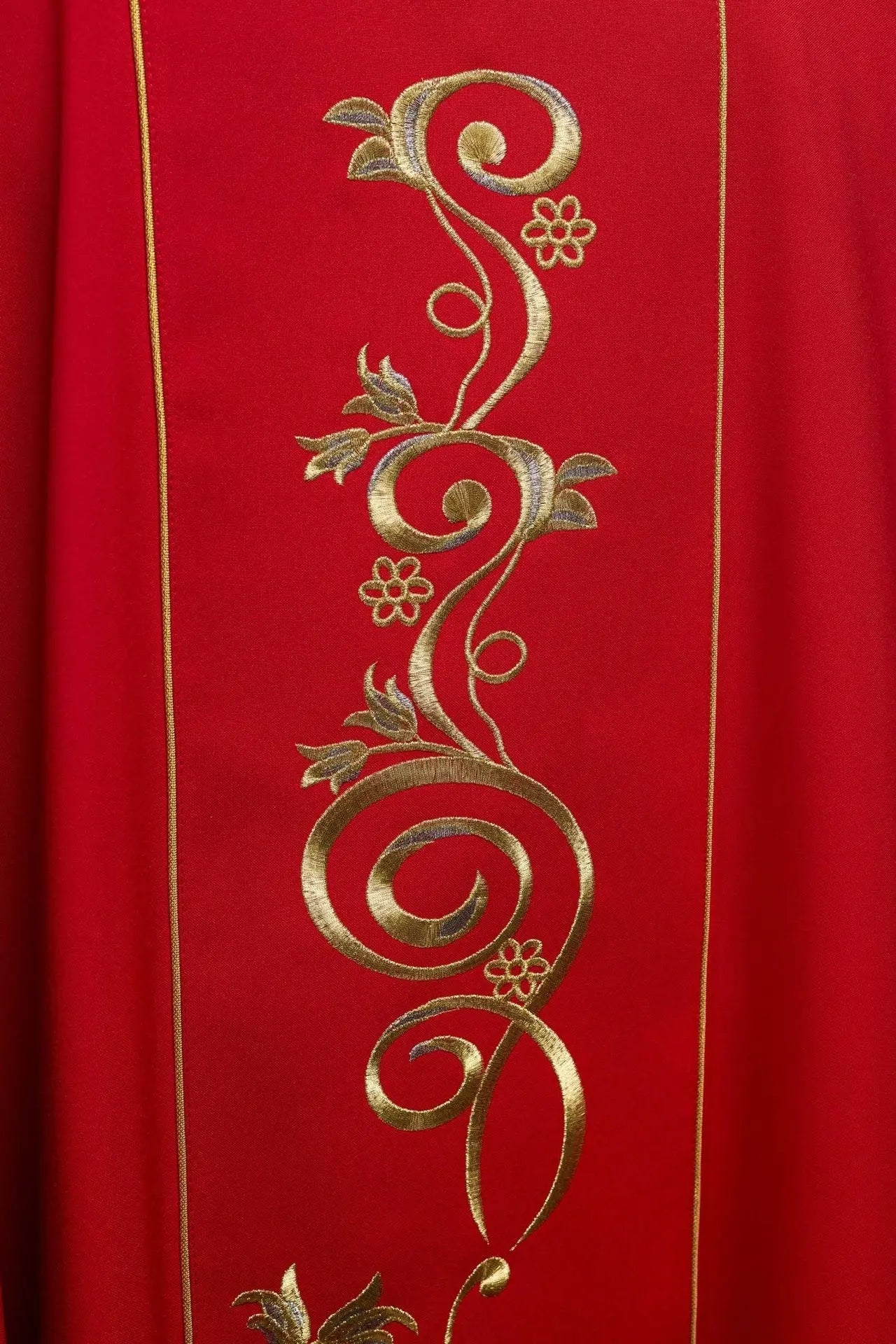 Red chasuble embroidered with IHS