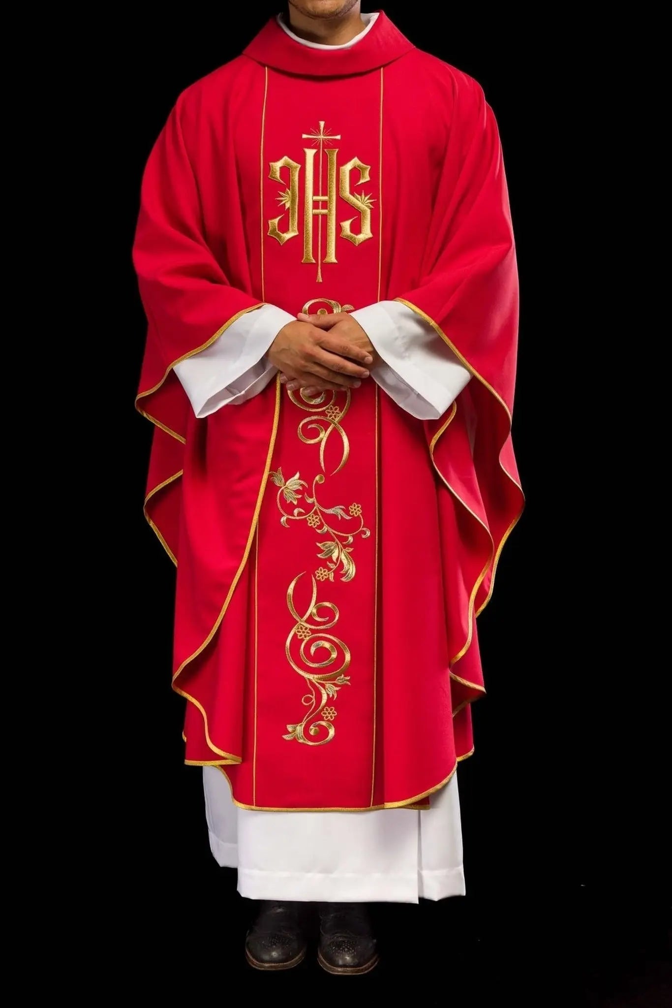 Red chasuble embroidered with IHS