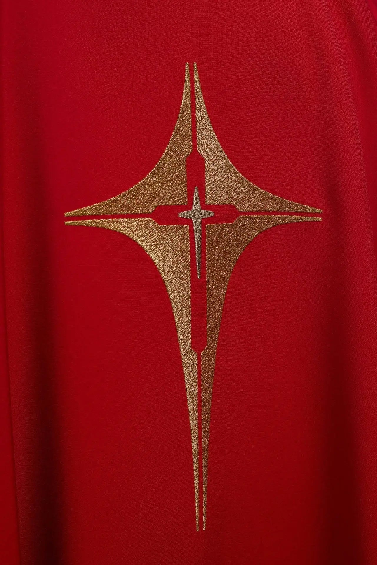 Red chasuble embroidered with cross motif