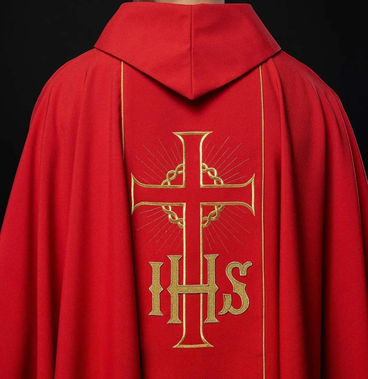 Red chasuble with decorated gold belt with IHS and ears