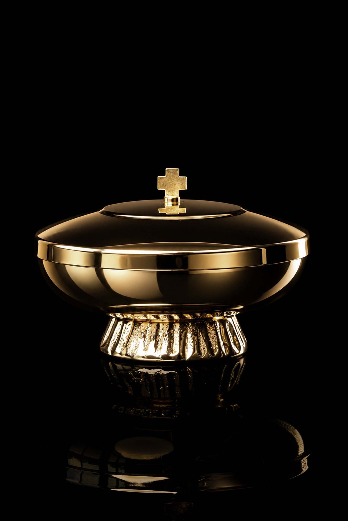 Gold-plated brass ciborium with a cross, front view showing fluted base
