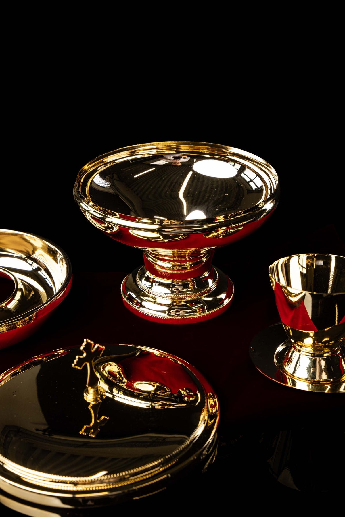 Gold-plated brass ciborium with matching cup and paten, grouped view