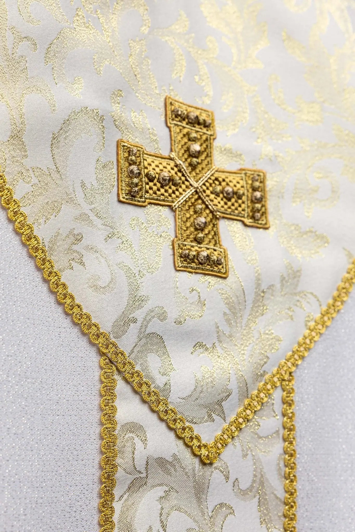 Ecru chasuble with gold cross and jacquard fabric decoration