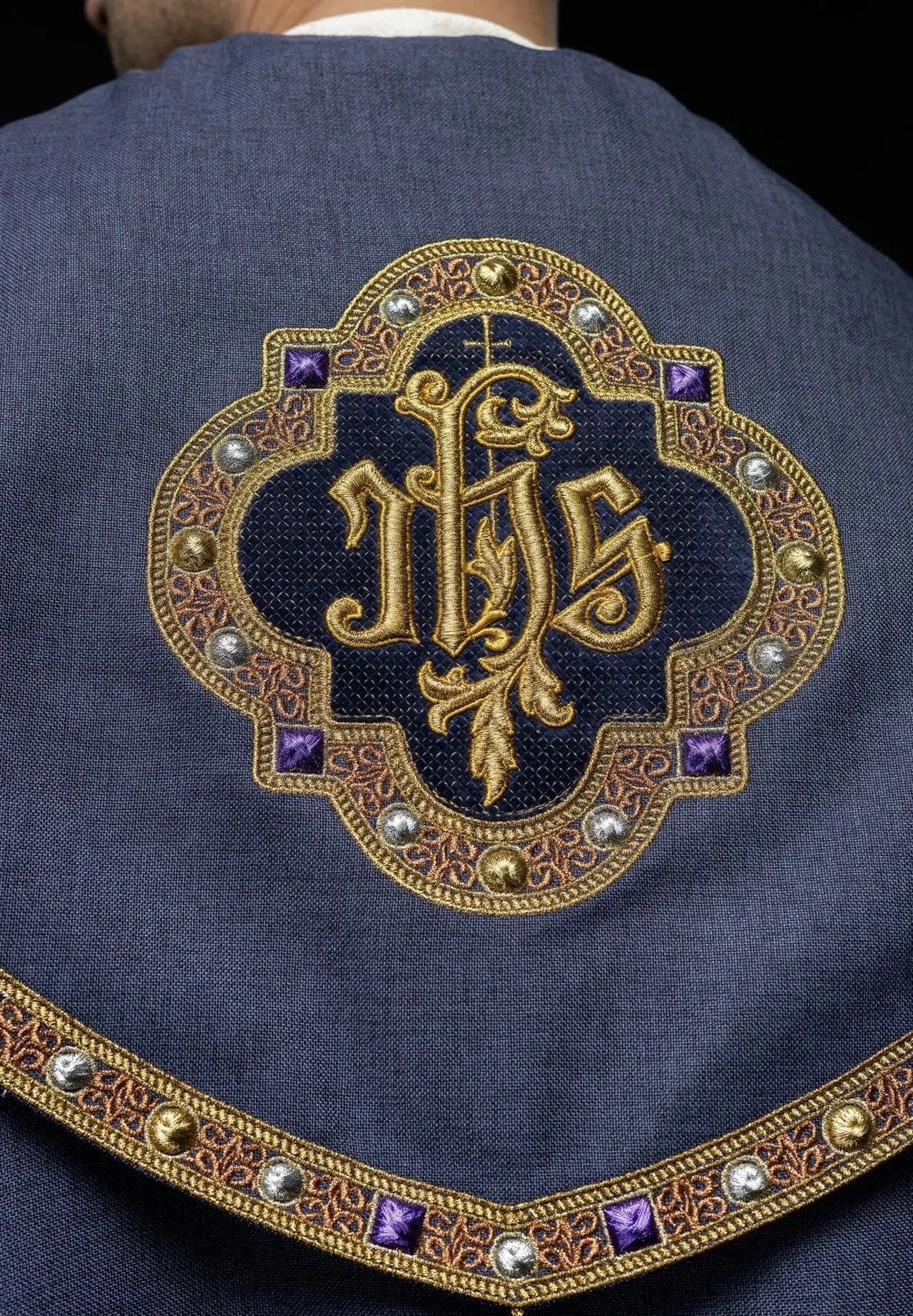 Purple liturgical cape with gold IHS