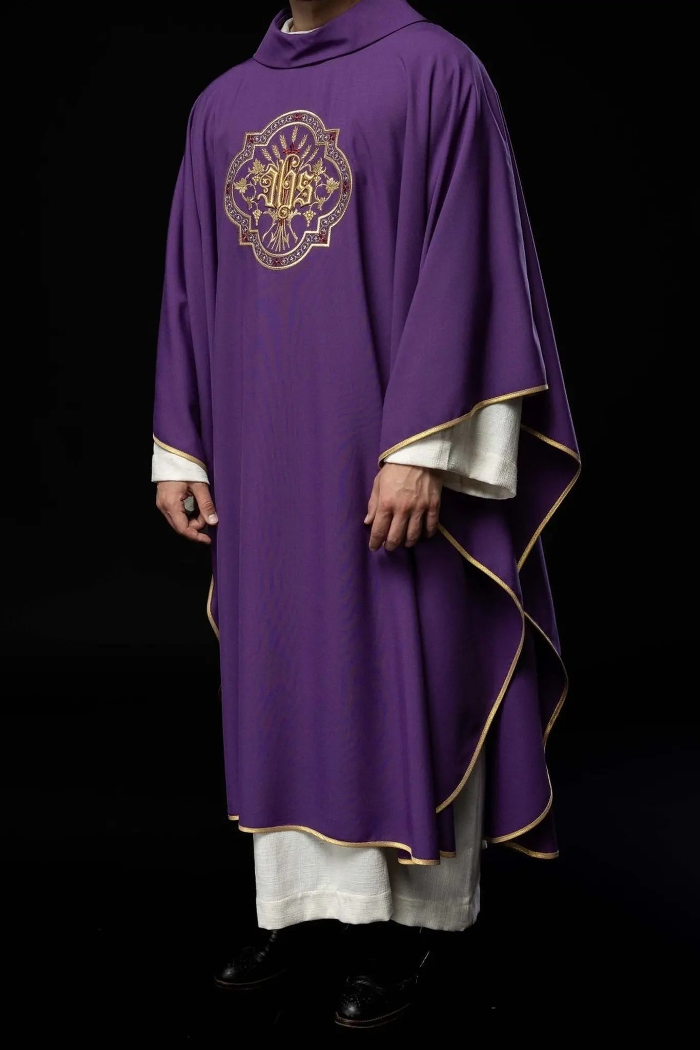 Purple chasuble with IHS and PAX embroidery