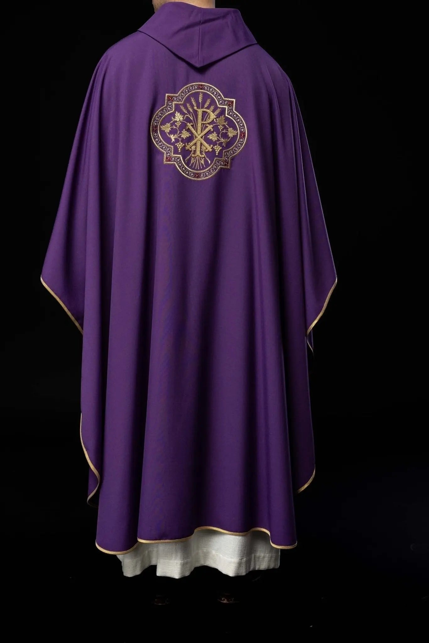 Purple chasuble with IHS and PAX embroidery