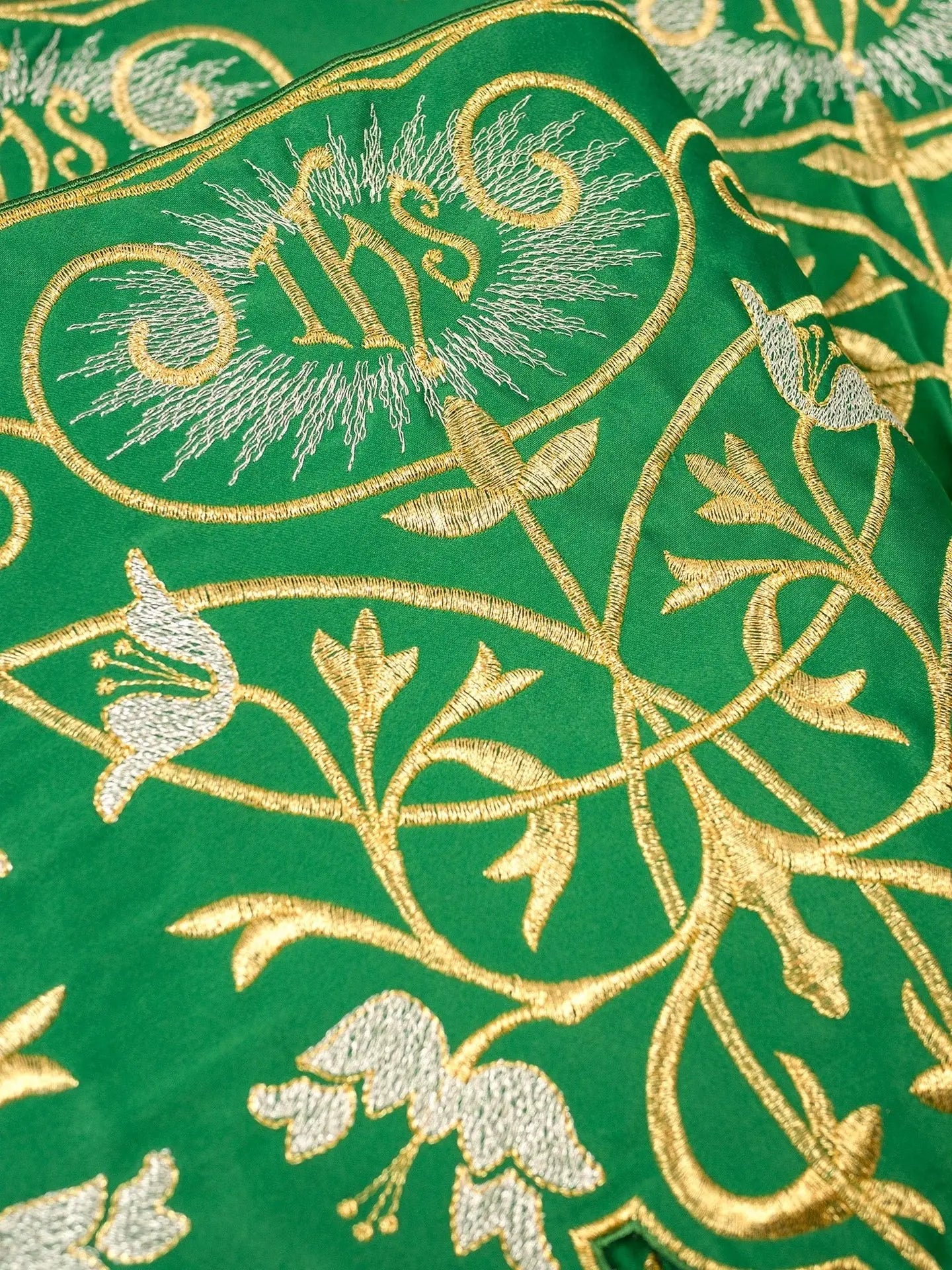 Licznik z monogramem IHS w kolorze zielonym