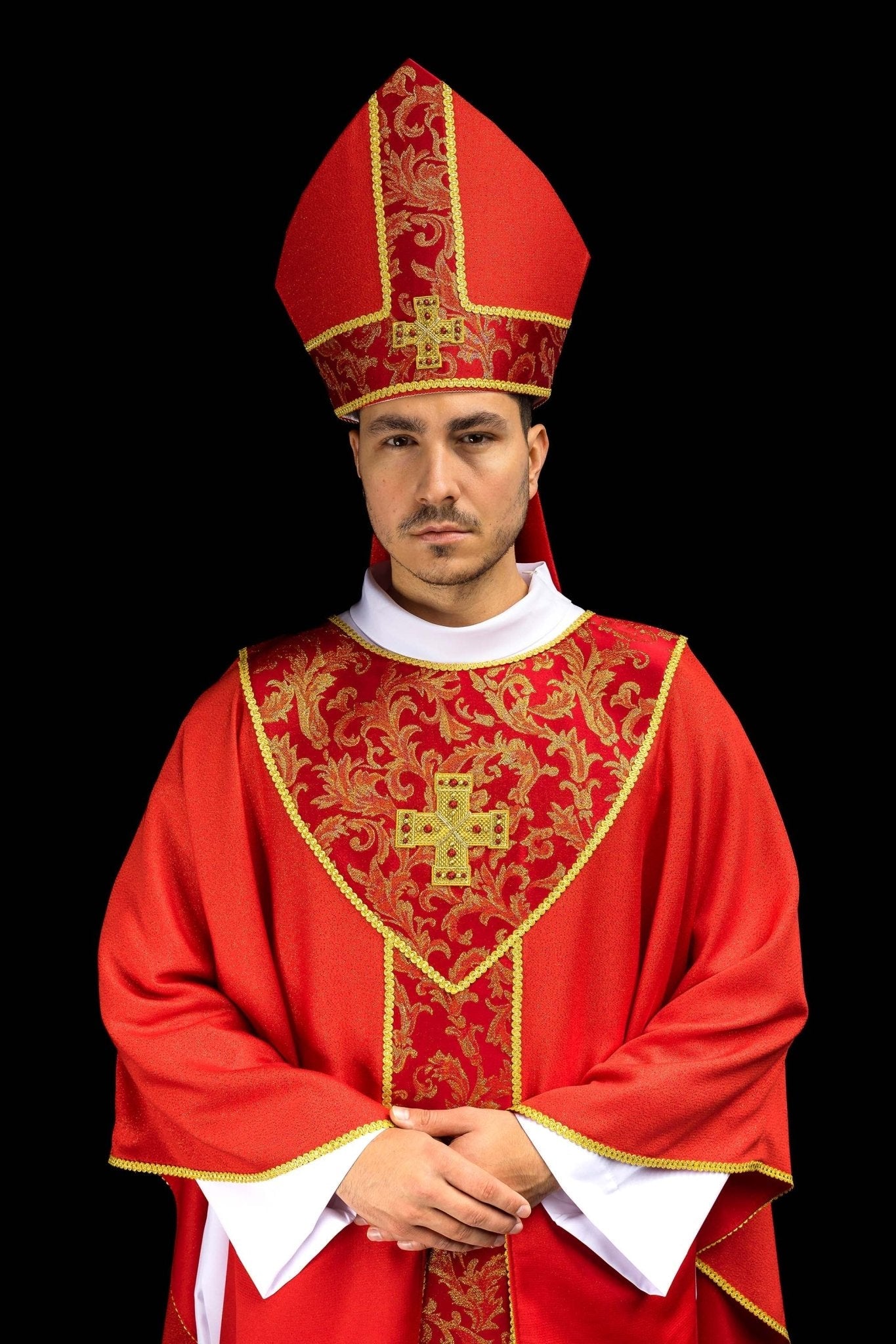Red embroidered mitre with a cross motif and decorative jacquard fabric
