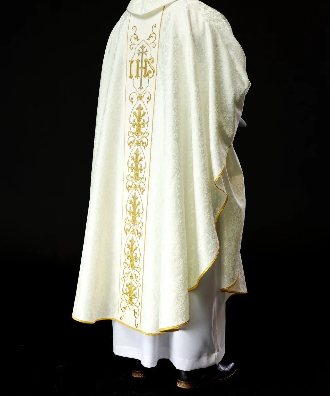 Ecru chasuble embroidered on decorative fabric with IHS symbol