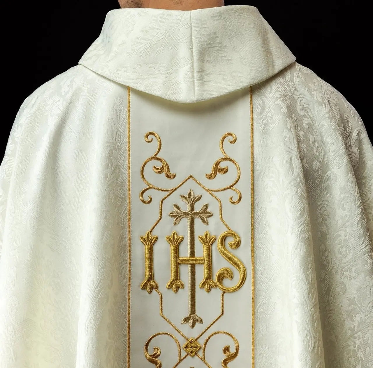 Ecru chasuble embroidered on decorative fabric with IHS symbol