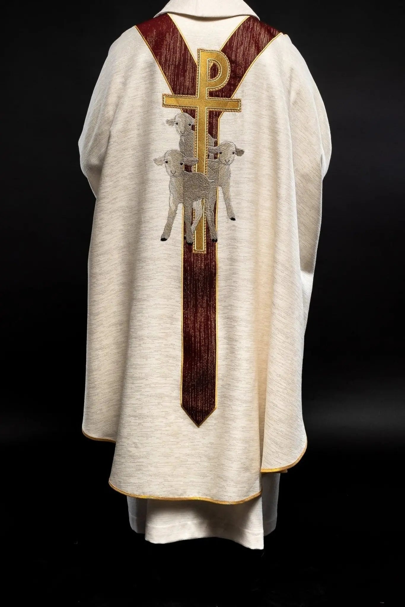 Chasuble ecru with the image of Jesus the Good Shepherd with a decorative burgundy stripe