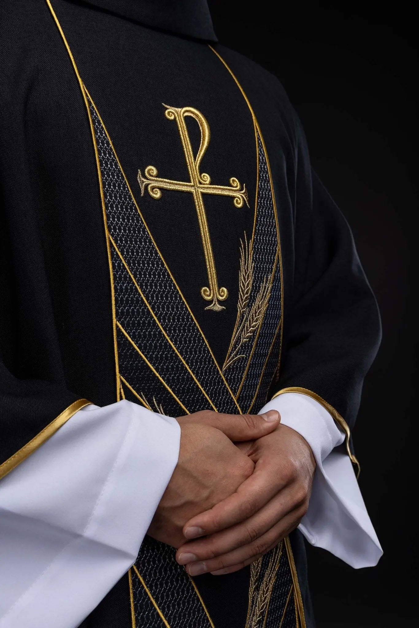 Black chasuble with embroidered PAX band and wheat motif