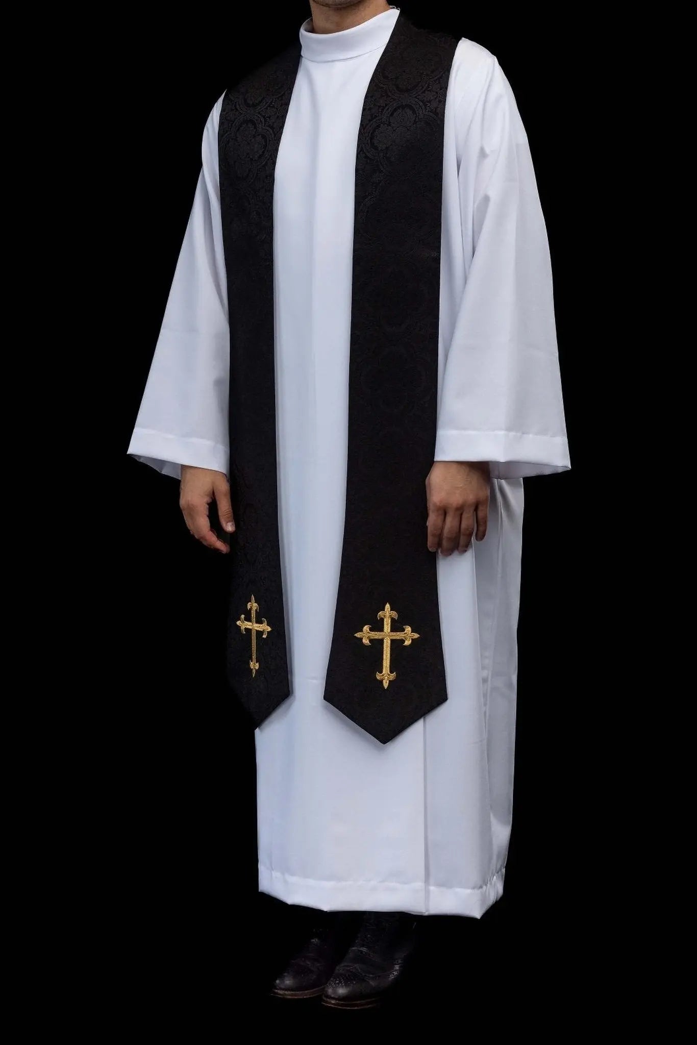 Black jacquard stole with embroidered gold crosses for liturgical use.