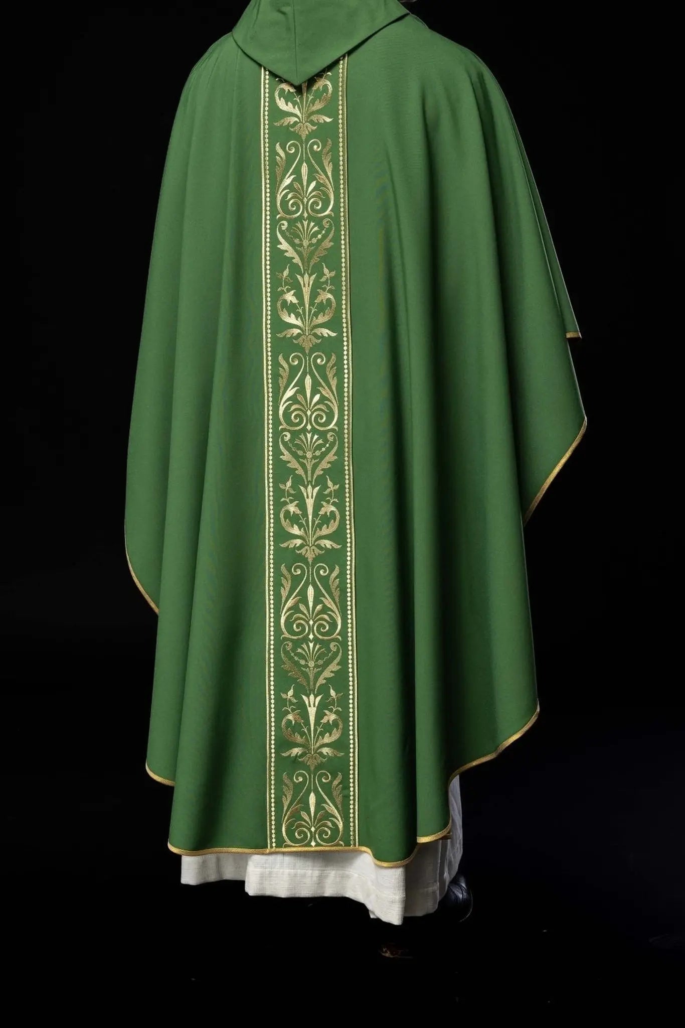 Green liturgical chasuble decorated with gold embroidered belt